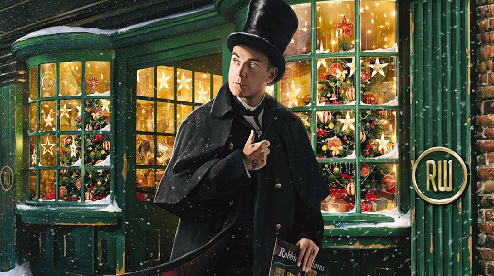 Robbie Williams Rises To #1 With Festive Album